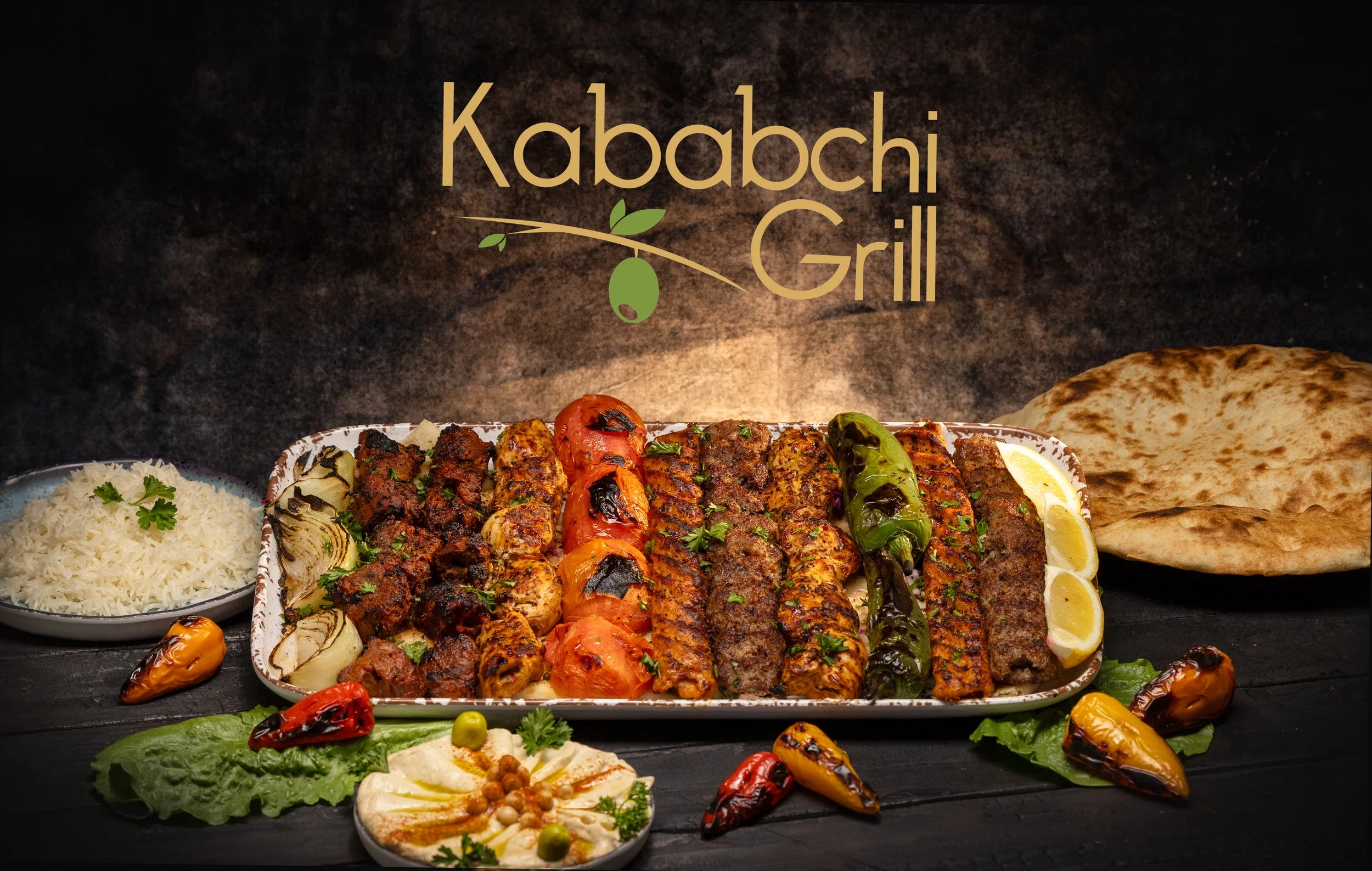 Kababchi Grill mixed grill platter with rice, flatbread, and peppers